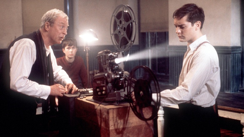 Michael Caine and Tobey Maguire with projector