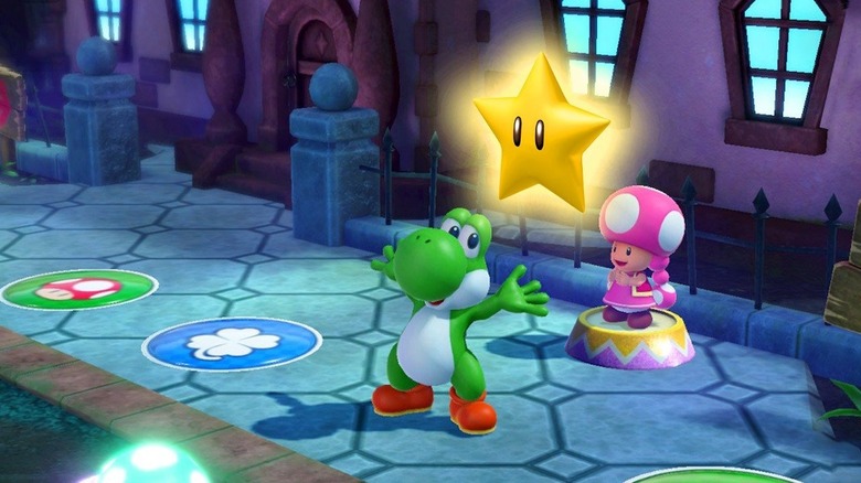 Yoshi holding star