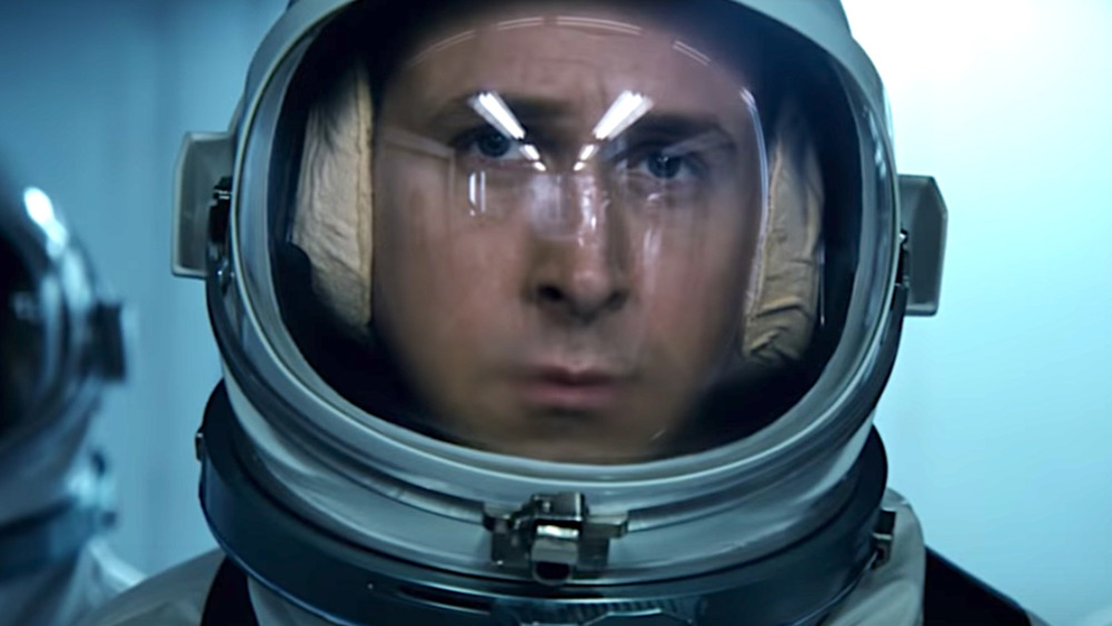 Neil Armstrong wearing an astronaut helmet