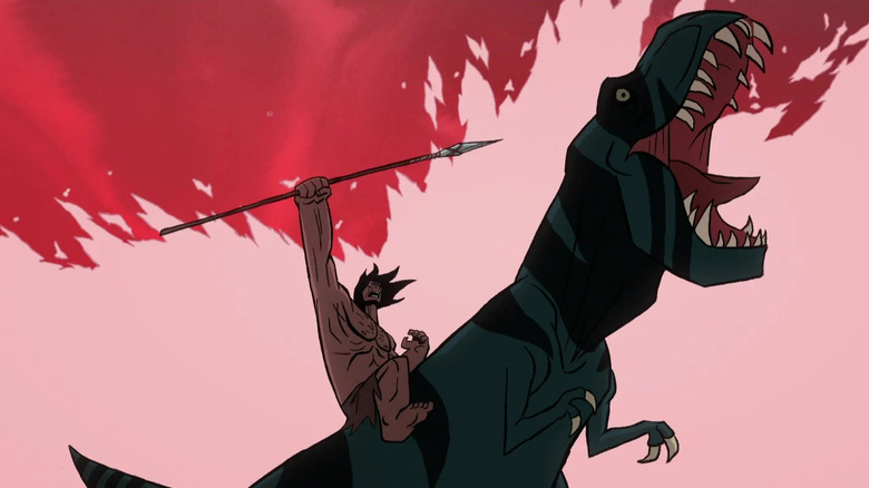 Spear raises a spear riding a roaring Fang in "Primal"