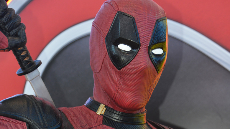Deadpool grabbing katana