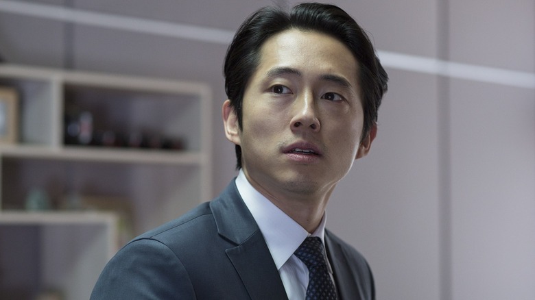 Derek wearing a suit and tie in "Mayhem" (2017)