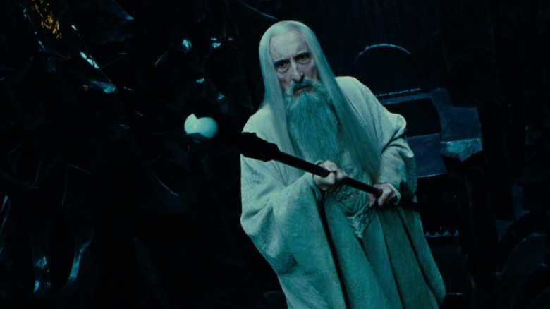 Saruman wields staff