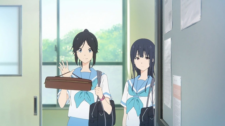The two leads of Liz and the Blue Bird standing in a doorway (2018)