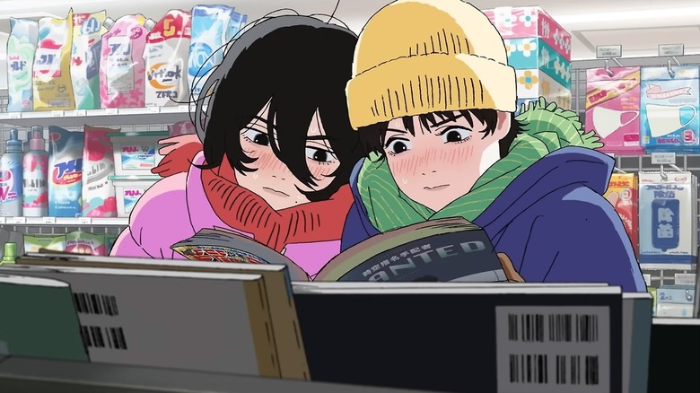 Fujino and Kyomoto looking through a book in Look Back (2024)