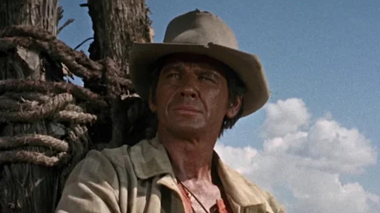 Harmonica leaning against a worn fence in "Once Upon a Time in the West"