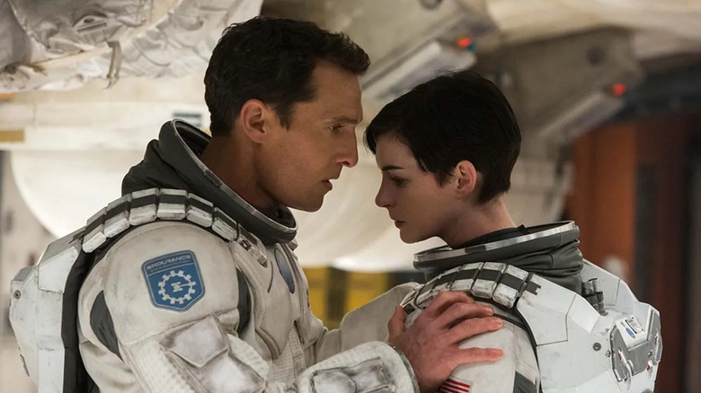 Coop comforting Brand on the ship in Interstellar