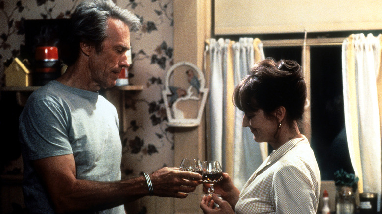 Robert Kincaid clinks wines glasses with Francesca Johnson in "The Bridges of Madison County" (1995)