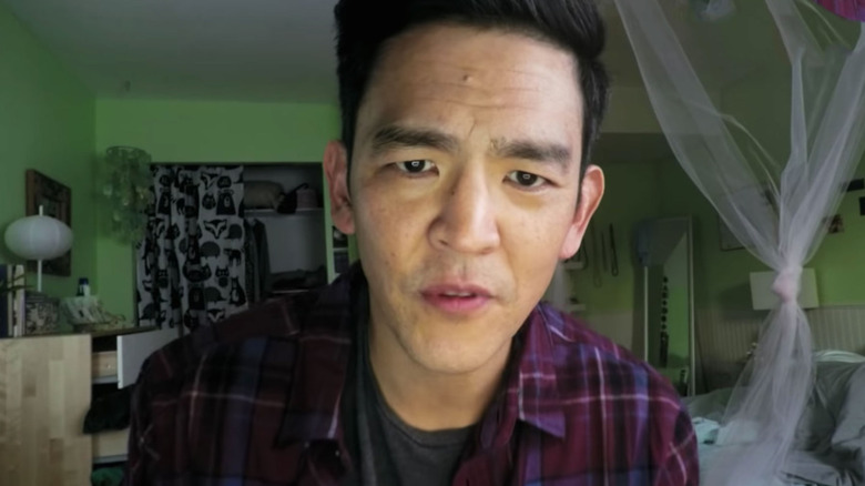 David staring into the laptop web camera in "Searching."