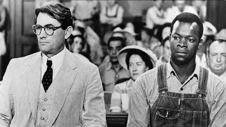 Atticus Finch sits next to Tom Robinson in "To Kill a Mockingbird" (1962)