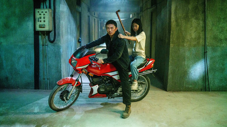 Wang Wei rescuing Rainy in The Furious (2026)