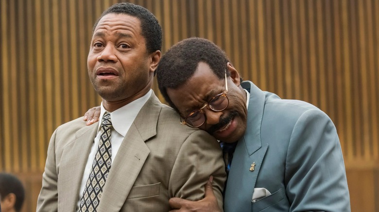 Johnnie Cochran hugging O.J. Simpson in "The People v. O. J. Simpson: American Crime Story"