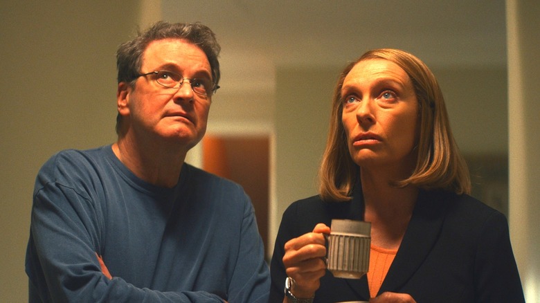 Michael Peterson and Kathleen Peterson in their home gazing upwards in "The Staircase" (2022)