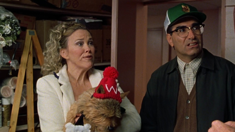 Cookie, Gerry, and their dog inside a storage room in Best in Show