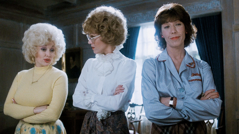 Doralee Judy and Violet standing in a room in 9 to 5