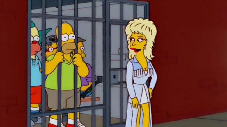 Dolly next to a jail cell with Homer in it on The Simpsons