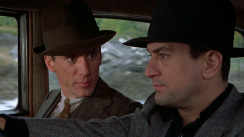 Max looking at Noodles as they ride in a car together in Once Upon at Time in America (1984)