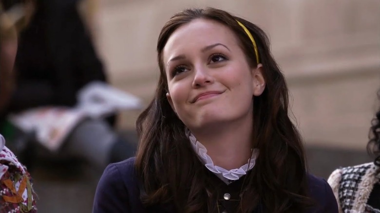 Blair smirking and wearing a headband looking up on Gossip Girl