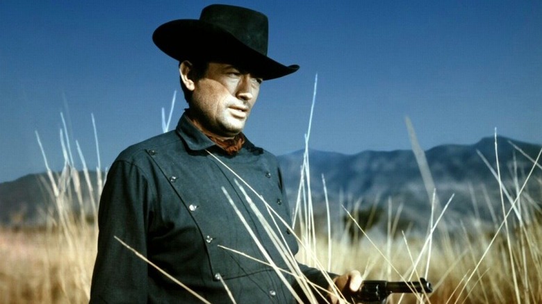 Jim Douglass cornering a scoundrel in "The Bravados" (1958)