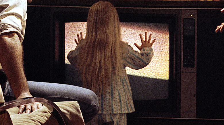 Carol Anne sees a ghost in the TV static in "Poltergeist" (1982)
