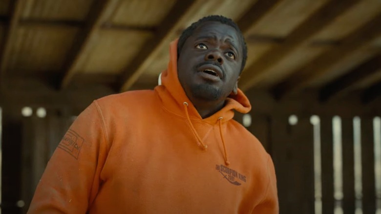 Otis "OJ" Haywood Jr. looking upward, concerned in "Nope"