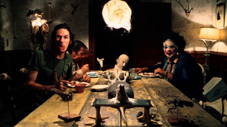 The Sawyer family settling in for dinner in The Texas Chain Saw Massacre (1974)