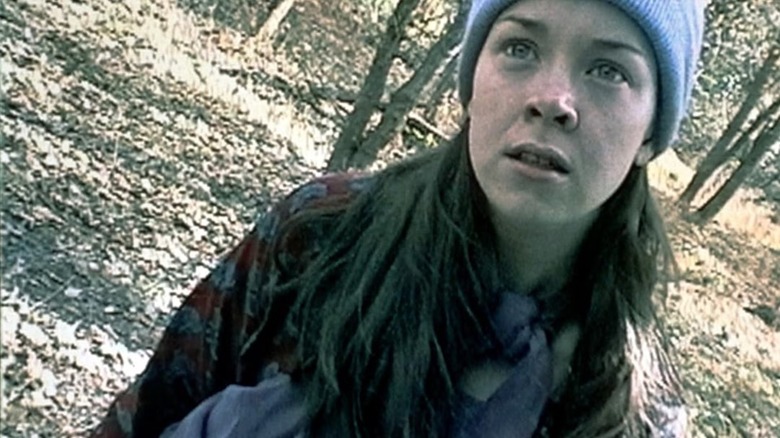 Heather looking distressed on-camera in "The Blair Witch Project"