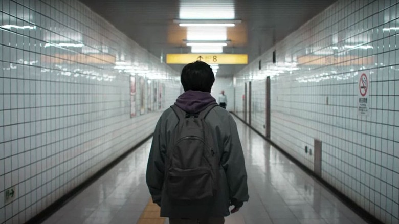The Lost Man looking down a corridor in "Exit 8"