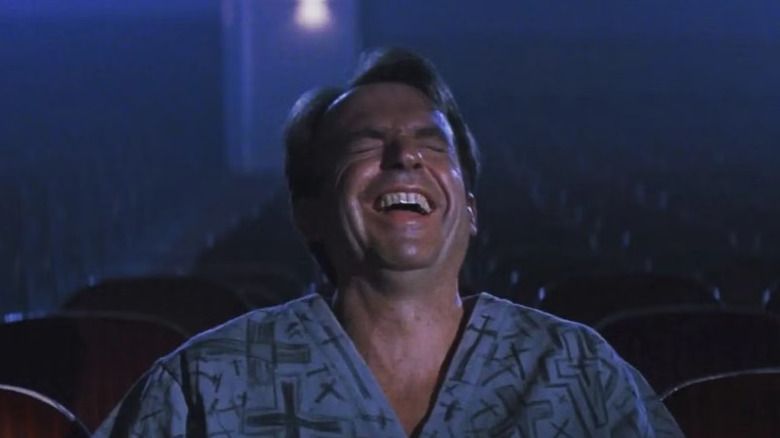 John Trent seeing the movie of his life in In the Mouth of Madness (1994)