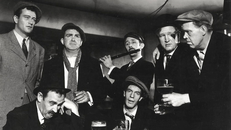 A group of sailors sit in a bar in "The Long Voyage Home" (1940)