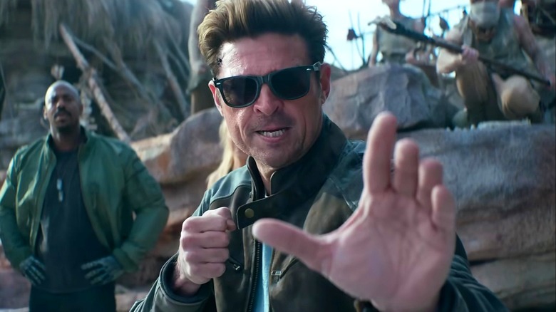 Johnny Cage wearing sunglasses and preparing to fight in Mortal Kombat II
