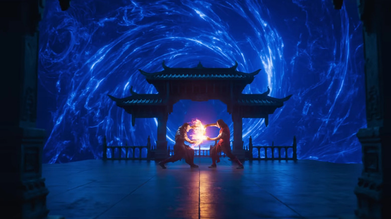 Kung Lao and Liu Kang fighting in front of a portal in Mortal Kombat II