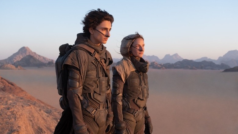 Paul and Lady Jessica in sandy southern Arakis in Dune (2021)