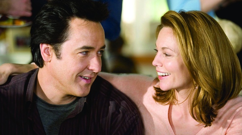 Jake and Sarah talking and smiling in Must Love Dogs