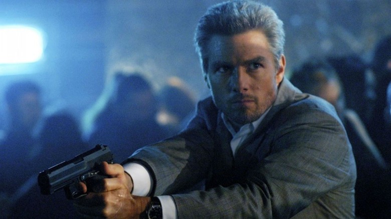Vincent holds a gun inside a nightclub in Collateral