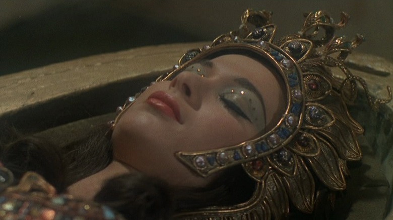 Queen Tera lying in a sarcophagus in Blood From the Mummy's Tomb