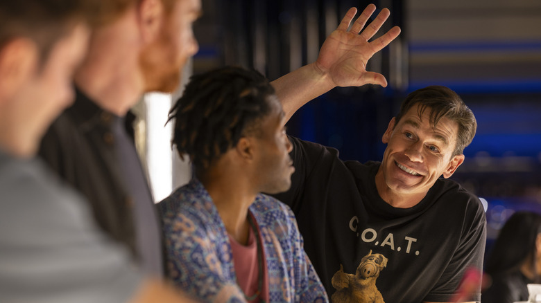 Rodney waving to his friends in Ricky Stanicky