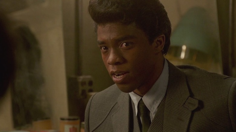 James in a grey suit and pompadour in Get On Up (2014)