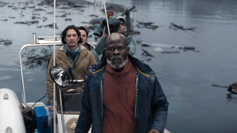 Dale with his boat crew looking concerned in Thrash (2026)