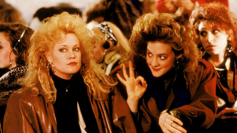 Tess and Cyn gossip in "Working Girl"