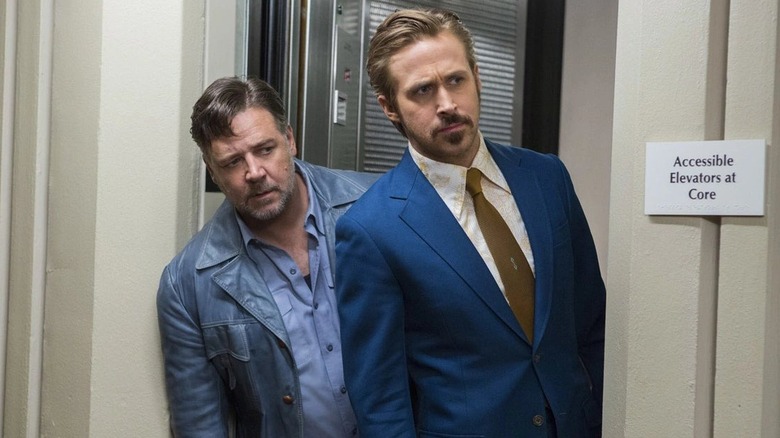 Jackson and Holland looking around a corner in The Nice Guys