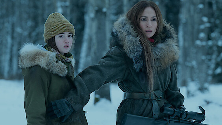 The Mother holds back Zoe in The Mother (2023)
