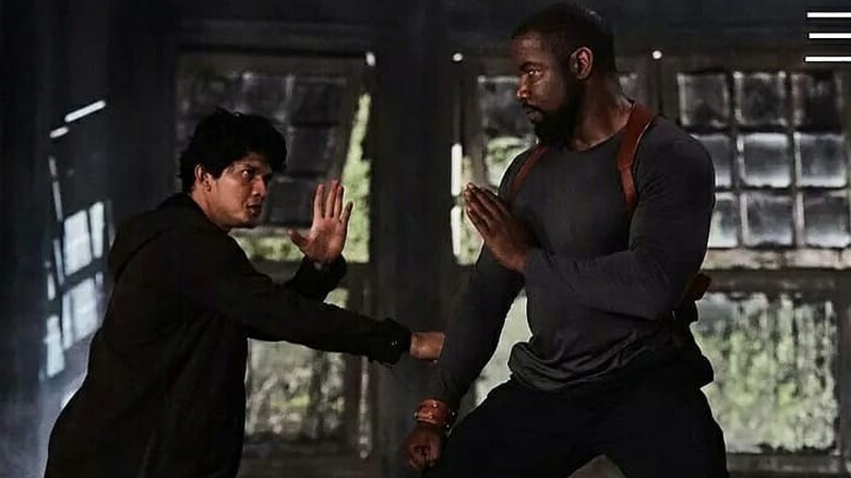 Jaka and Devereaux preparing to fight in "Triple Threat" (2019)