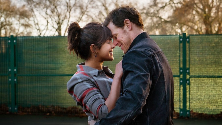 Mira and Rob about to kiss in Love Again