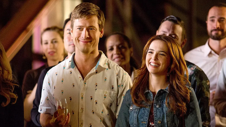 Harper and Charlie smiling at a party in Set It Up