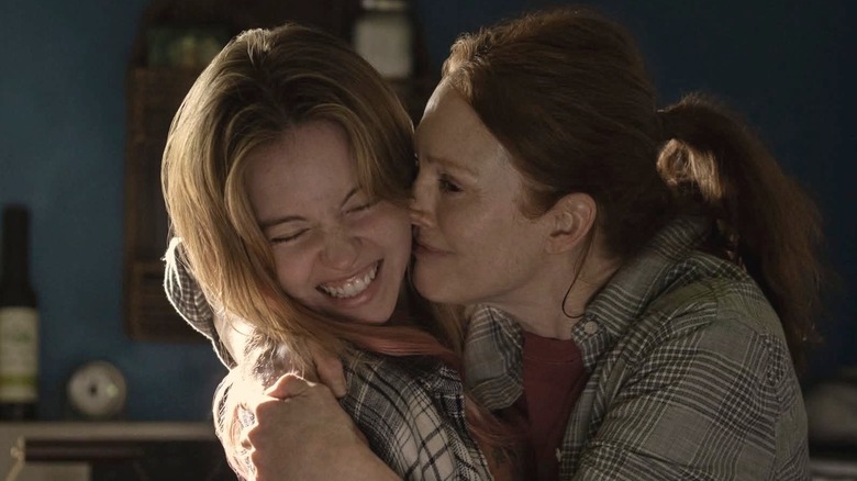 Kate hugs a smiling Claire in 
