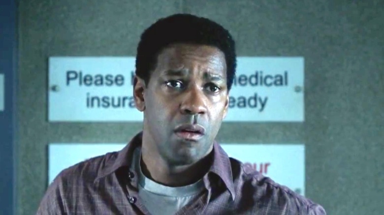 John looking worried in "John Q." (2002)