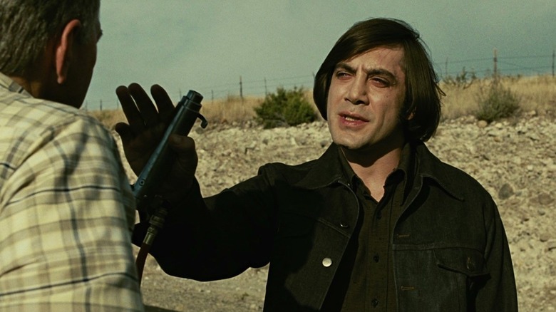 Anton Chigurh about to take another life in No Country for Old Men (2007)