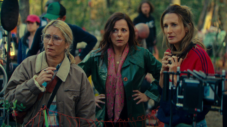Noemie and Andrea looking horrified on a set in Call My Agent! The Movie
