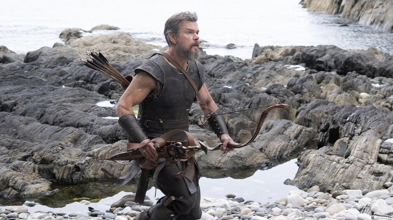 Odysseus runs on the shore in "The Odyssey" (2026)